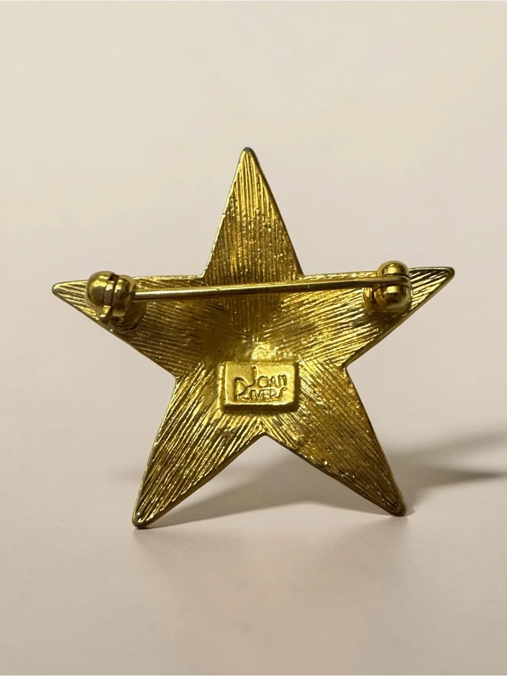 Joan Rivers Gold Star Brooch with Clear Crystals